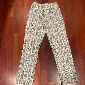 Snake skin print. She’ll: 100% lyocell